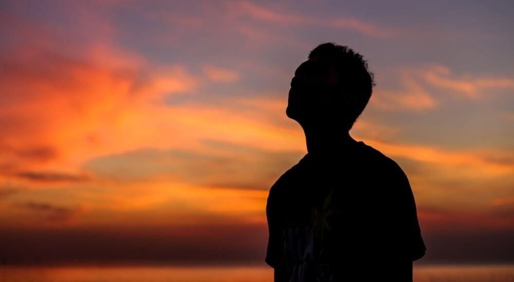 Man silhouette on beautiful sunset