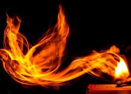 Burning matchstick